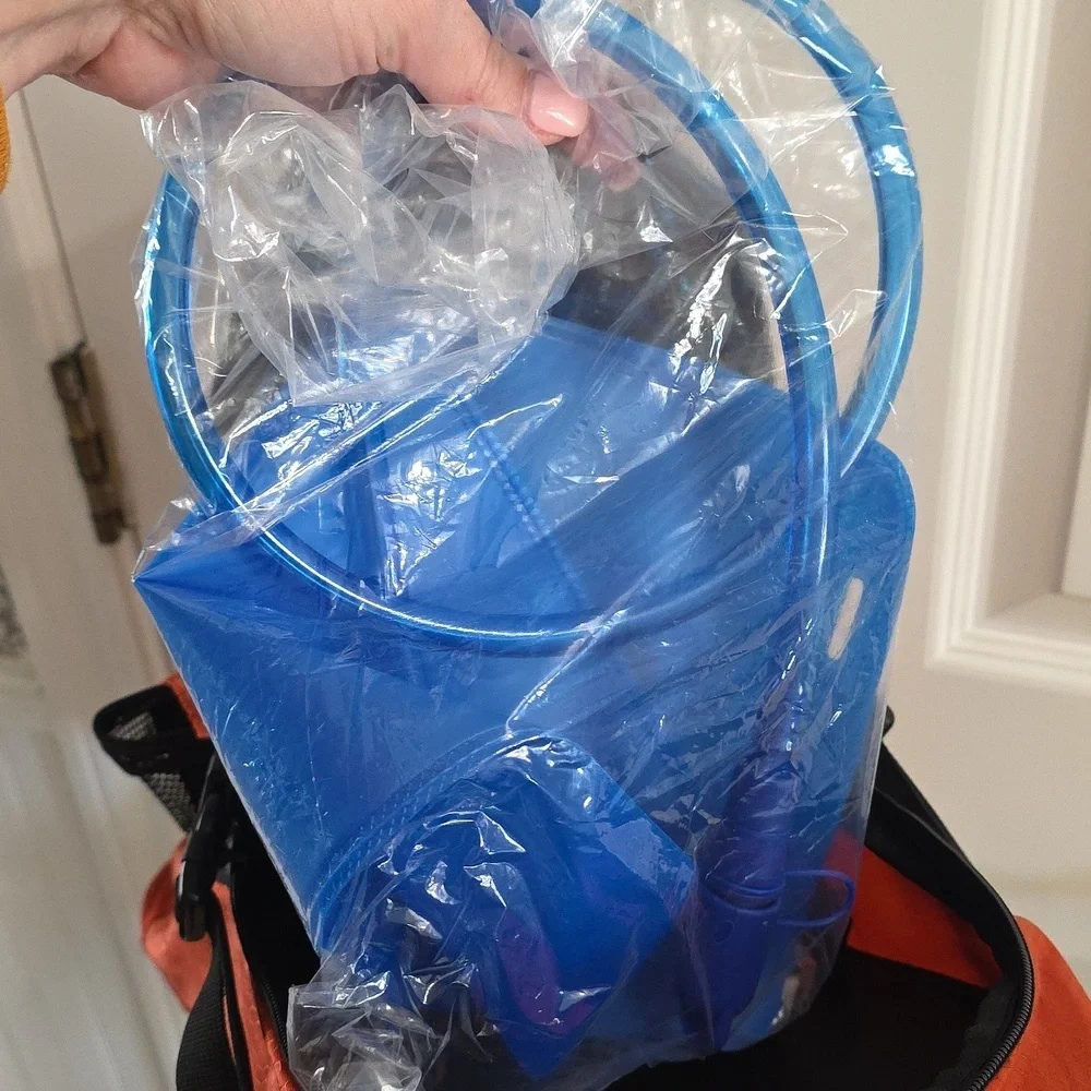 NWOT TOPI Orange Black Hydration Backpack Cooler Hiking Outdoor Travel​​